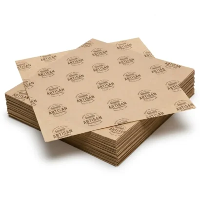 A neat stack of custom printed Brown Kraft Deli Paper Sheets on a plain white background