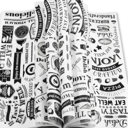 White custom greaseproof paper with black food doodles and a soft shadow